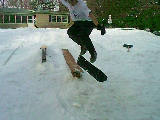 varialkickflipoffplank.jpg